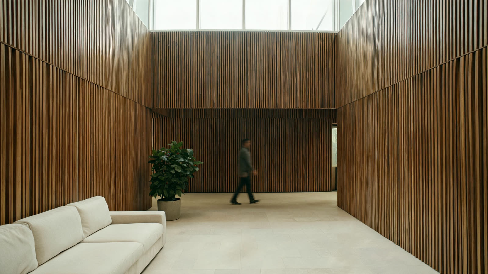 An office atrium clad in vertical oak slats